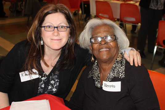 Two smiling women